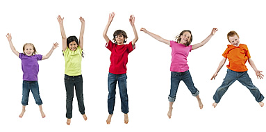 three children jumping in the air